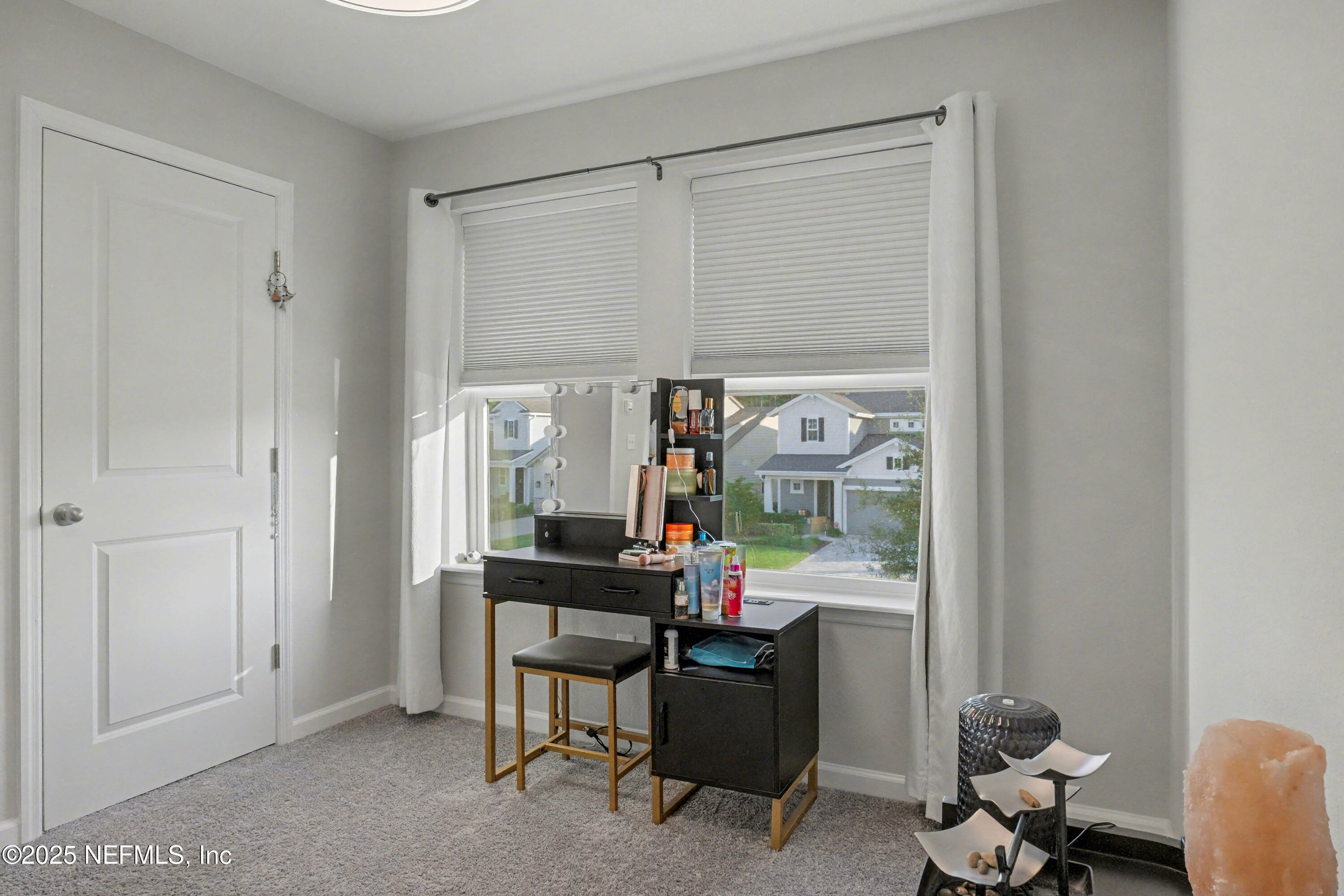 139 Spinner Drive Ponte Vedra, FL 32081 - Photo 30 of 67 a room with a table and a chair