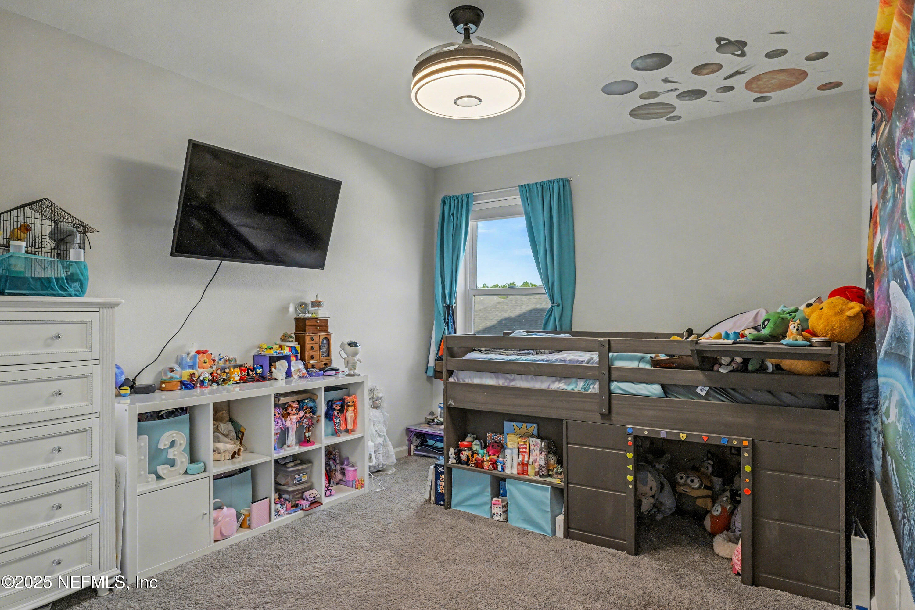 139 Spinner Drive Ponte Vedra, FL 32081 - Photo 36 of 67 a view of a livingroom with furniture and a flat screen tv