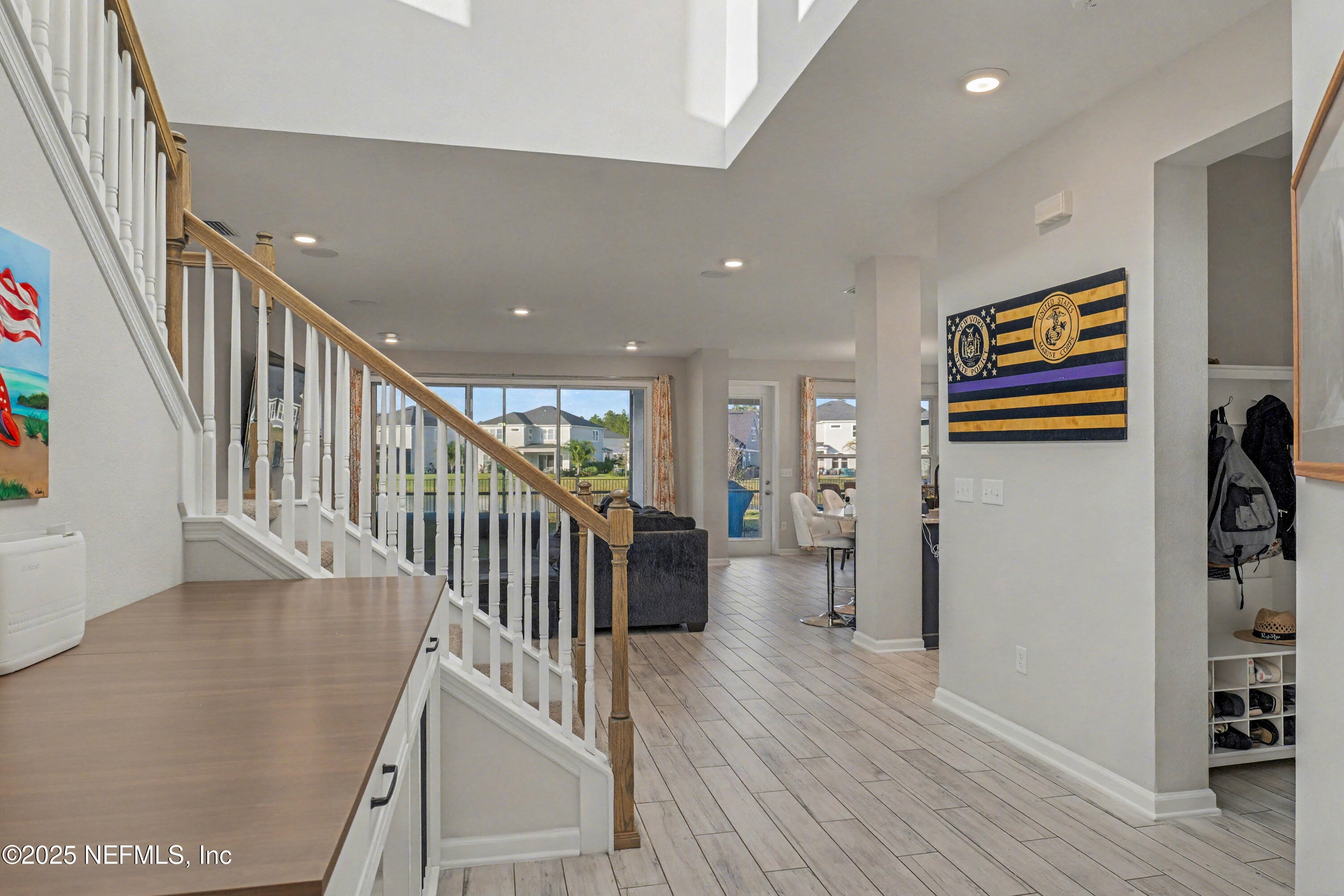 139 Spinner Drive Ponte Vedra, FL 32081 - Photo 9 of 67 a view of entryway with wooden floor and stairs