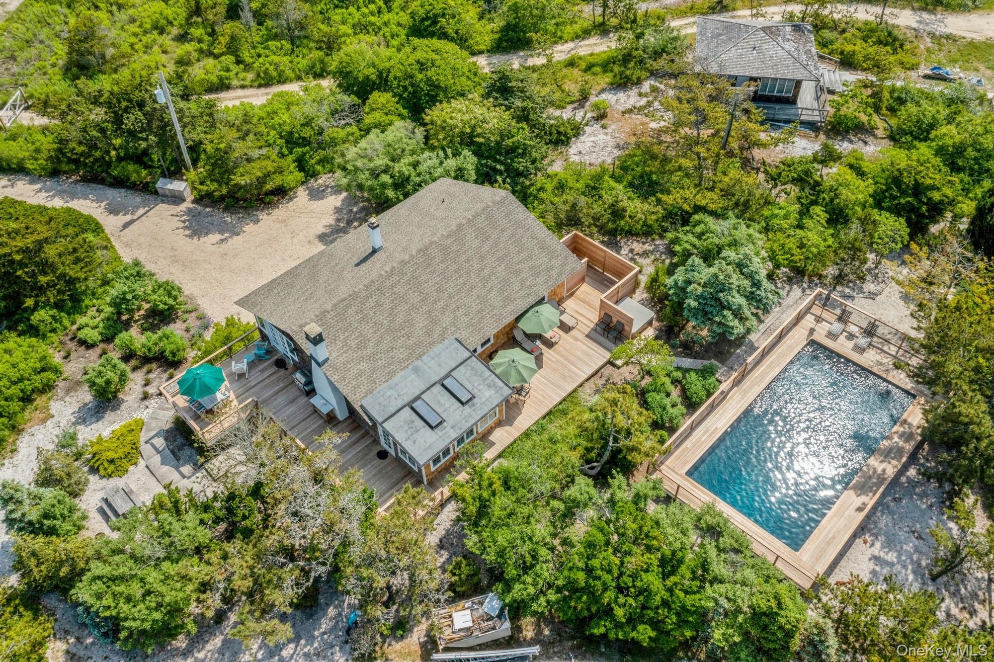 196 Dune Road Quogue, NY 11959 - Photo 23 of 31 Bird's eye view of a pool