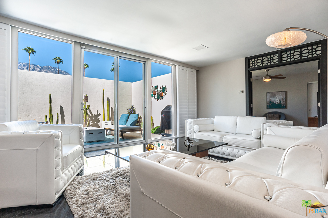 1805 Sandcliff Road Palm Springs, CA 92264 - Photo 7 of 51 a living room with furniture and a large window