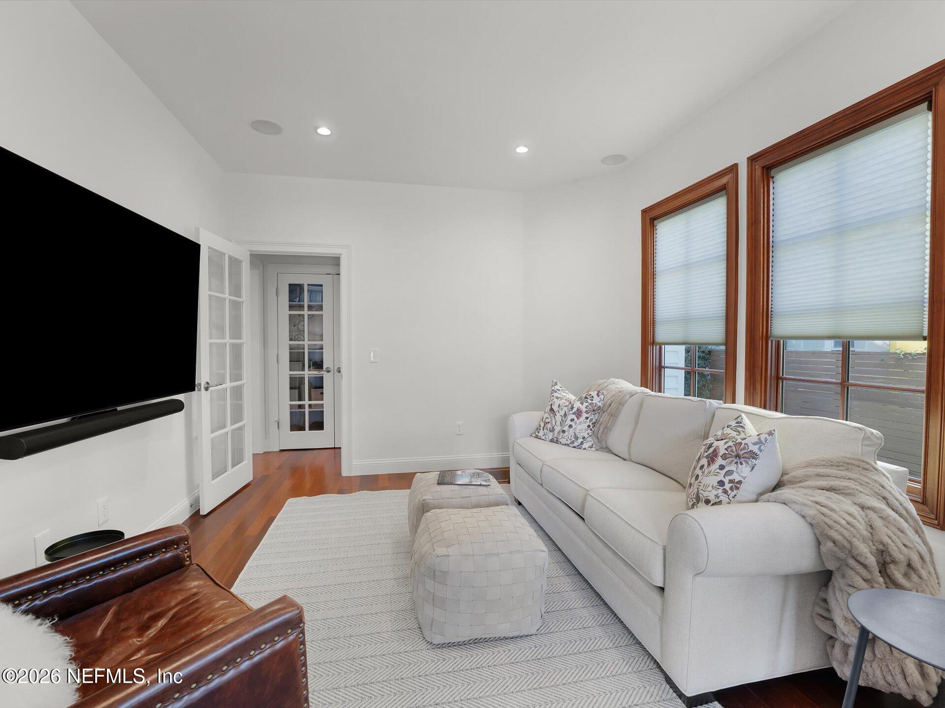 322 6th Street Atlantic Beach, FL 32233 - Photo 20 of 45 a living room with furniture and a flat screen tv