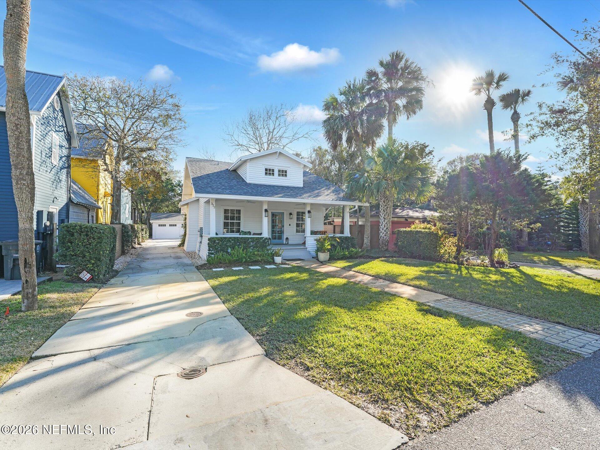322 6th Street Atlantic Beach, FL 32233 - Photo 2 of 45 a view of a house with swimming pool and sitting area