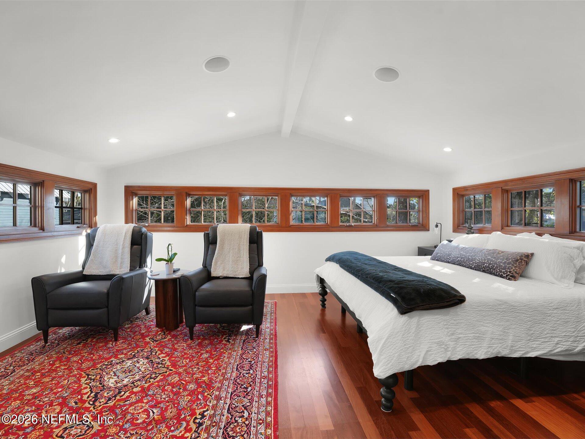 322 6th Street Atlantic Beach, FL 32233 - Photo 28 of 45 a bedroom with furniture and a wooden floor