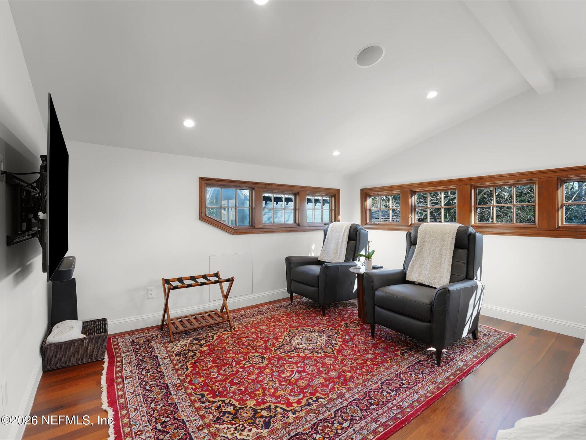 322 6th Street Atlantic Beach, FL 32233 - Photo 29 of 45 a living room with furniture rug and a flat screen tv