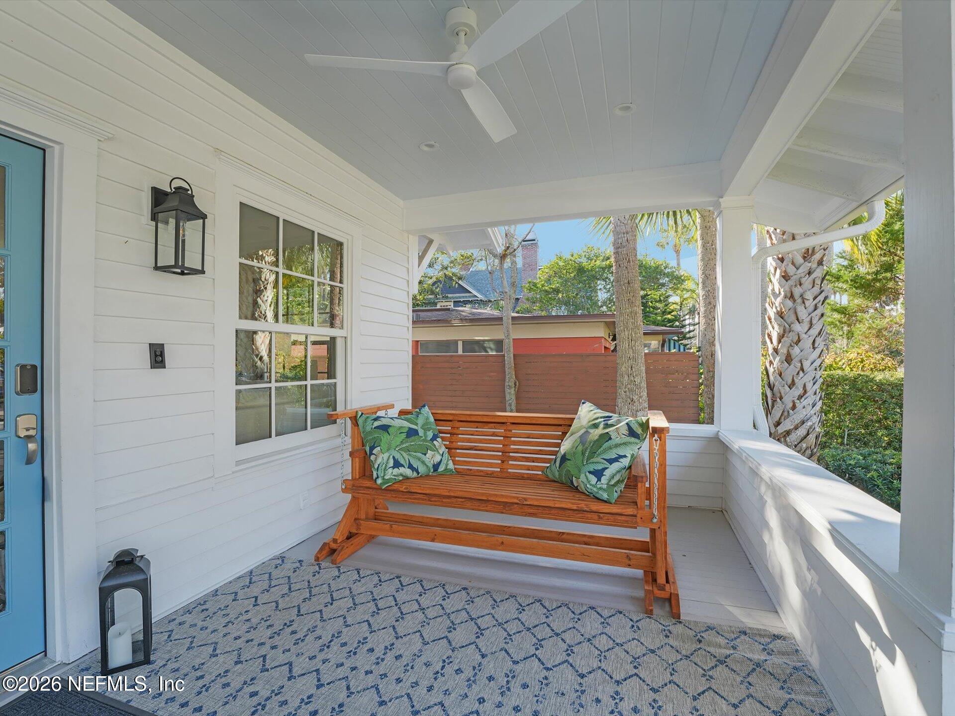 322 6th Street Atlantic Beach, FL 32233 - Photo 5 of 45 a wooden bench sitting in front of a window
