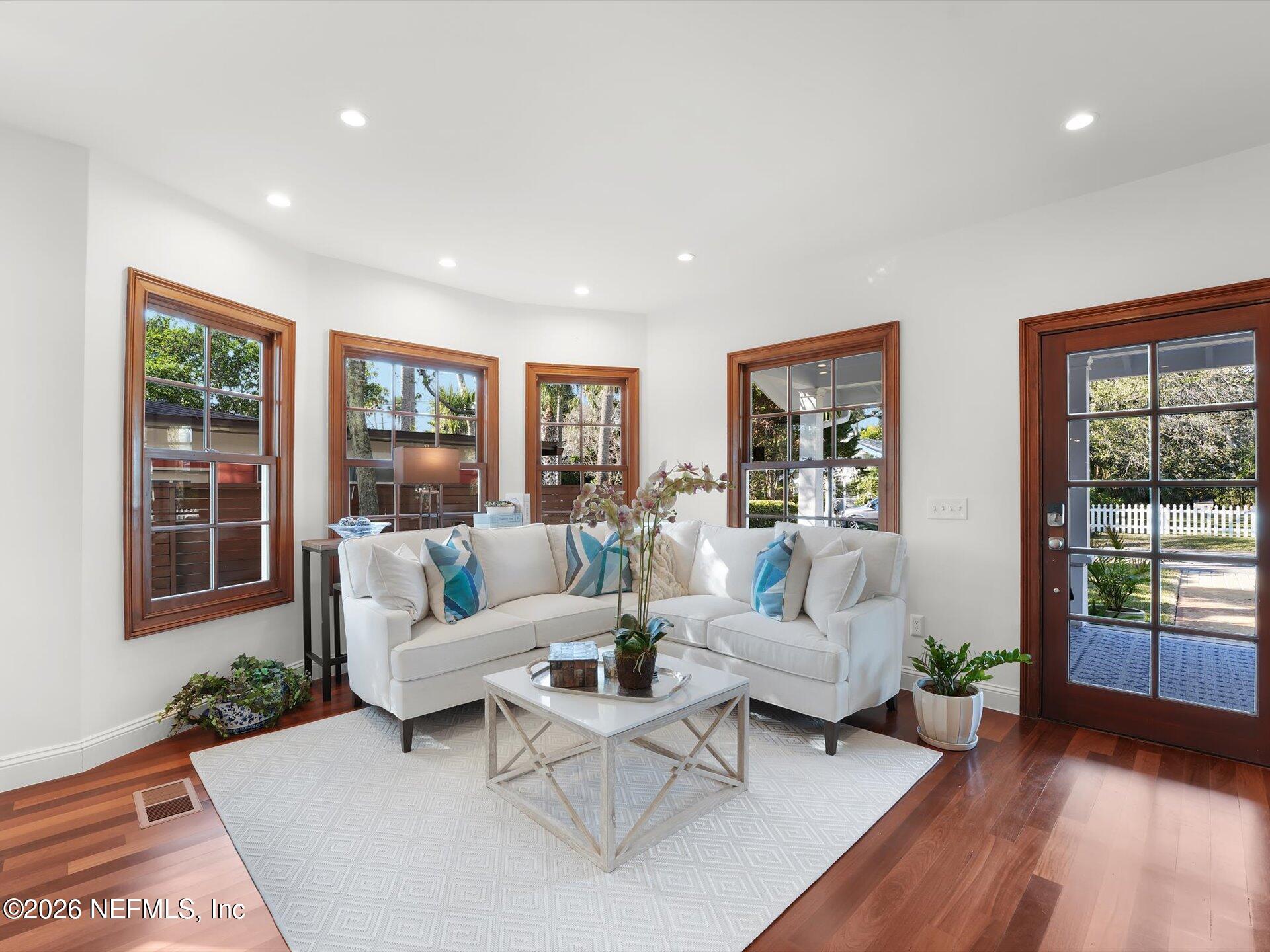 322 6th Street Atlantic Beach, FL 32233 - Photo 10 of 45 a living room with furniture and large windows