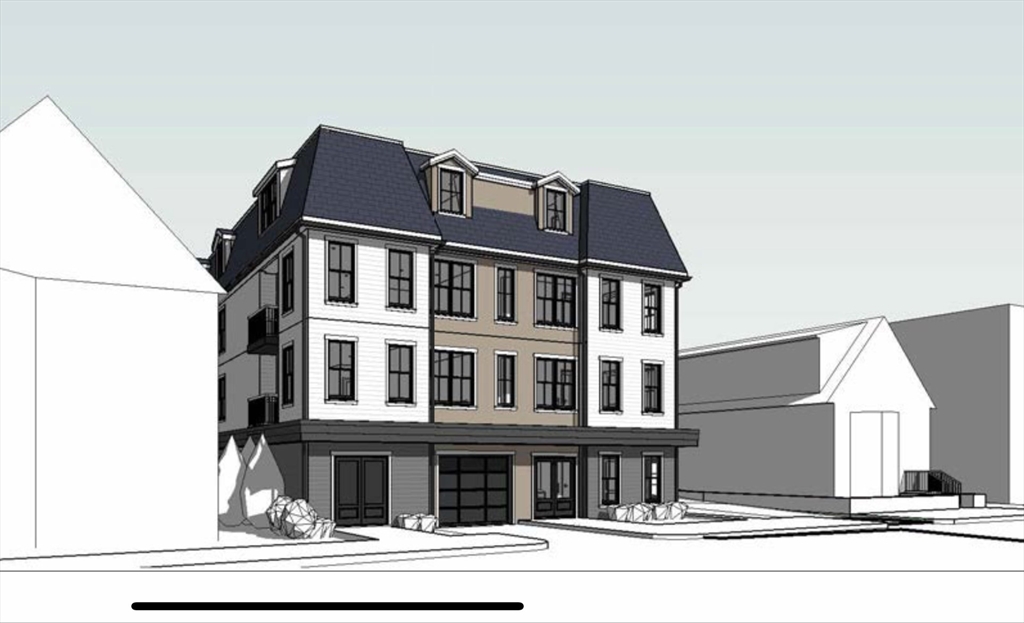 a front view of a building with a yard