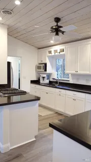 a living room with a couch and a table