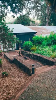 a large kitchen with a sink and cabinets