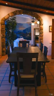 a view of a wooden house with a yard