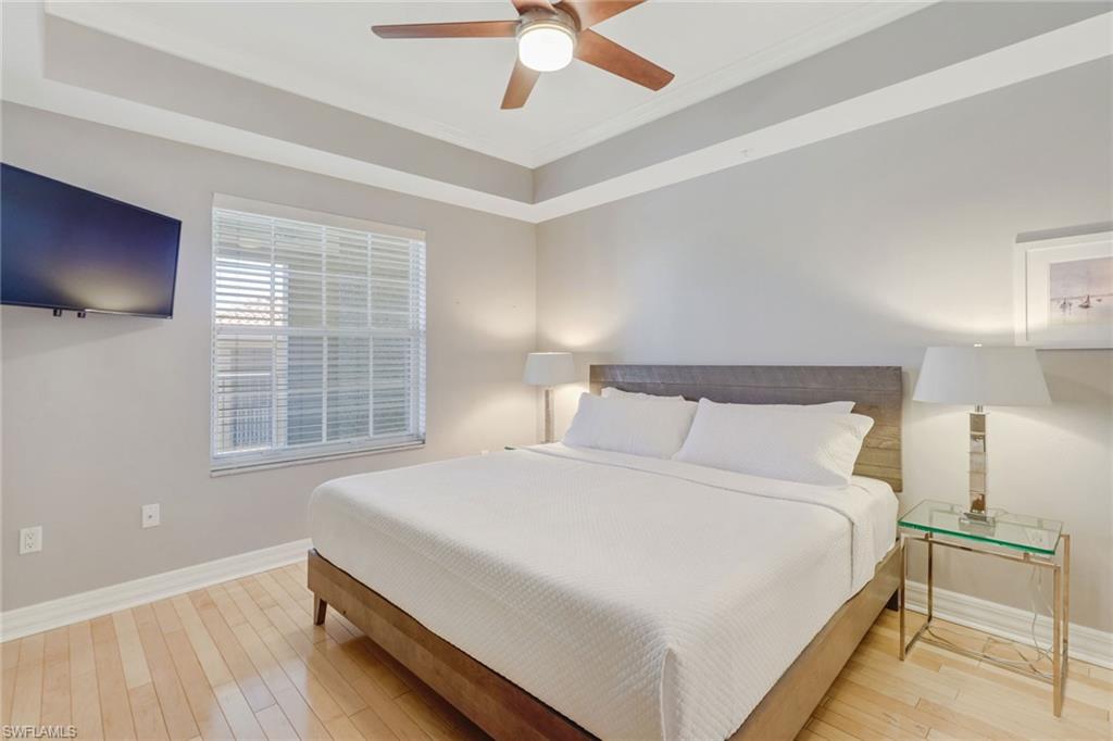 401 Bayfront Place, Unit 3303 Naples, FL 34102 - Photo 8 of 22 a bedroom with a bed and window