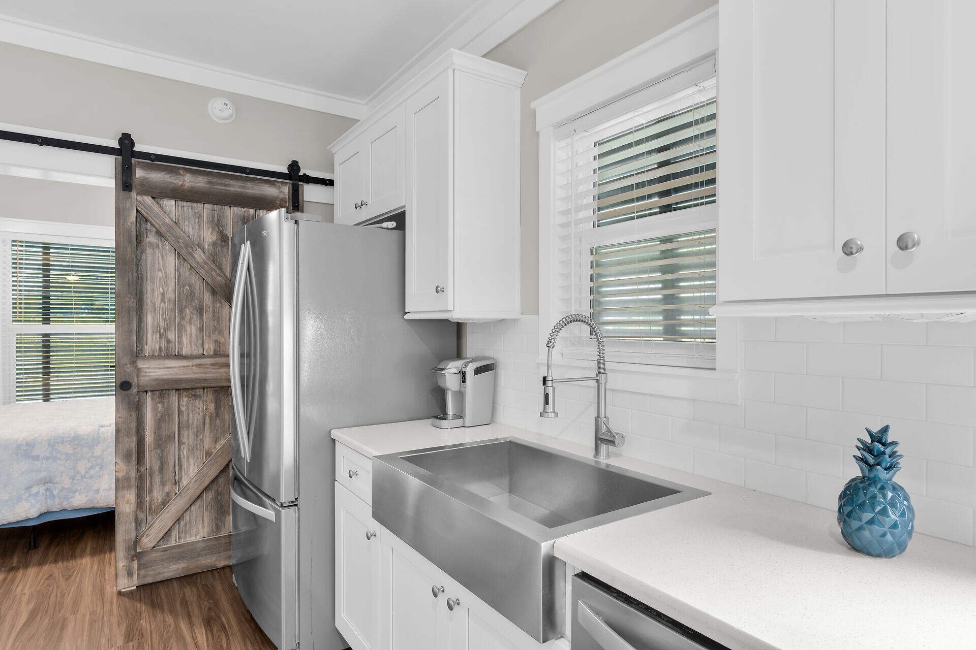 101 11th Street, Unit 19 Marathon, FL 33050 - Photo 8 of 27 a kitchen with a refrigerator and a sink