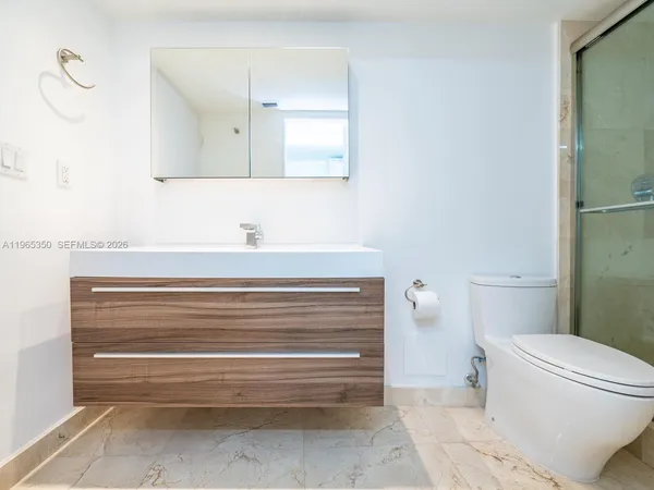 a bathroom with a sink and a toilet