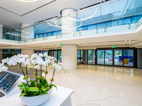 a view of swimming pool with seating space