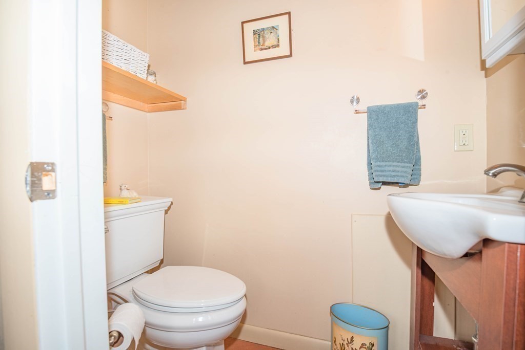 113 Indian Hollow Road Chesterfield, MA 01012 - Photo 12 of 42 a bathroom with a toilet a sink and mirror
