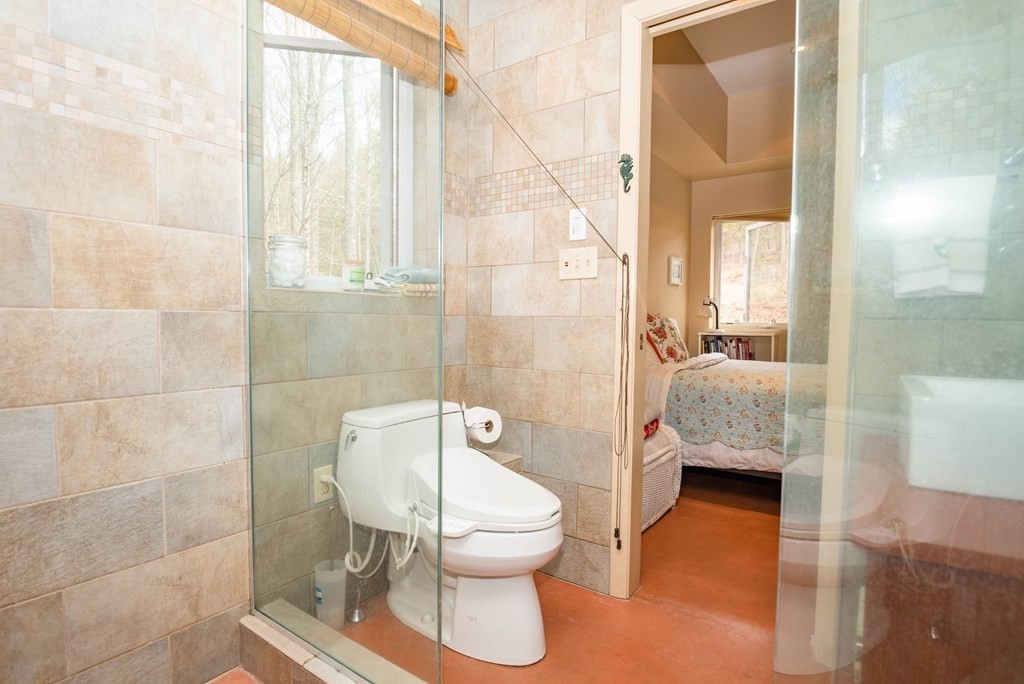 113 Indian Hollow Road Chesterfield, MA 01012 - Photo 16 of 42 a bathroom with a toilet and a shower