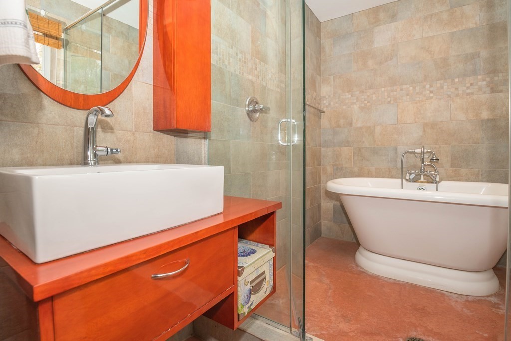 113 Indian Hollow Road Chesterfield, MA 01012 - Photo 18 of 42 a room with a sink and a mirror