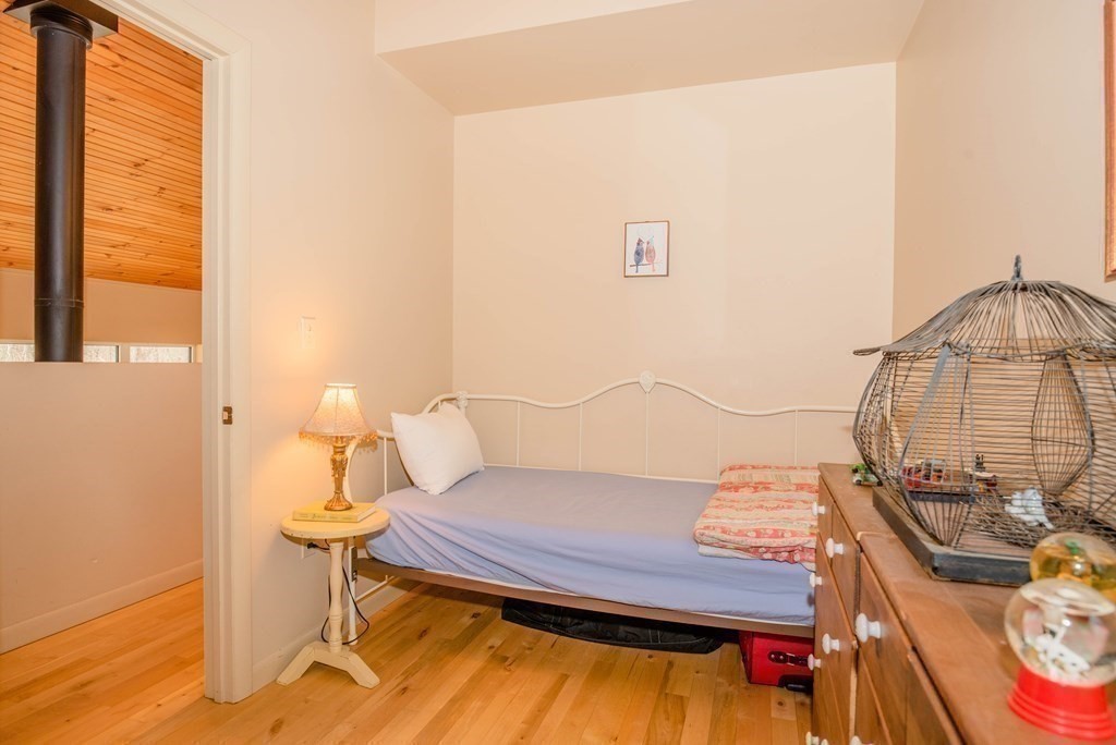 113 Indian Hollow Road Chesterfield, MA 01012 - Photo 25 of 42 a view of a room with a table and chairs