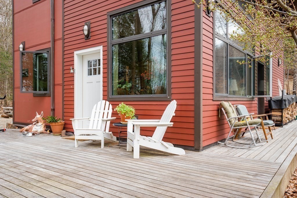 113 Indian Hollow Road Chesterfield, MA 01012 - Photo 3 of 42 a view of a two chairs in the balcony