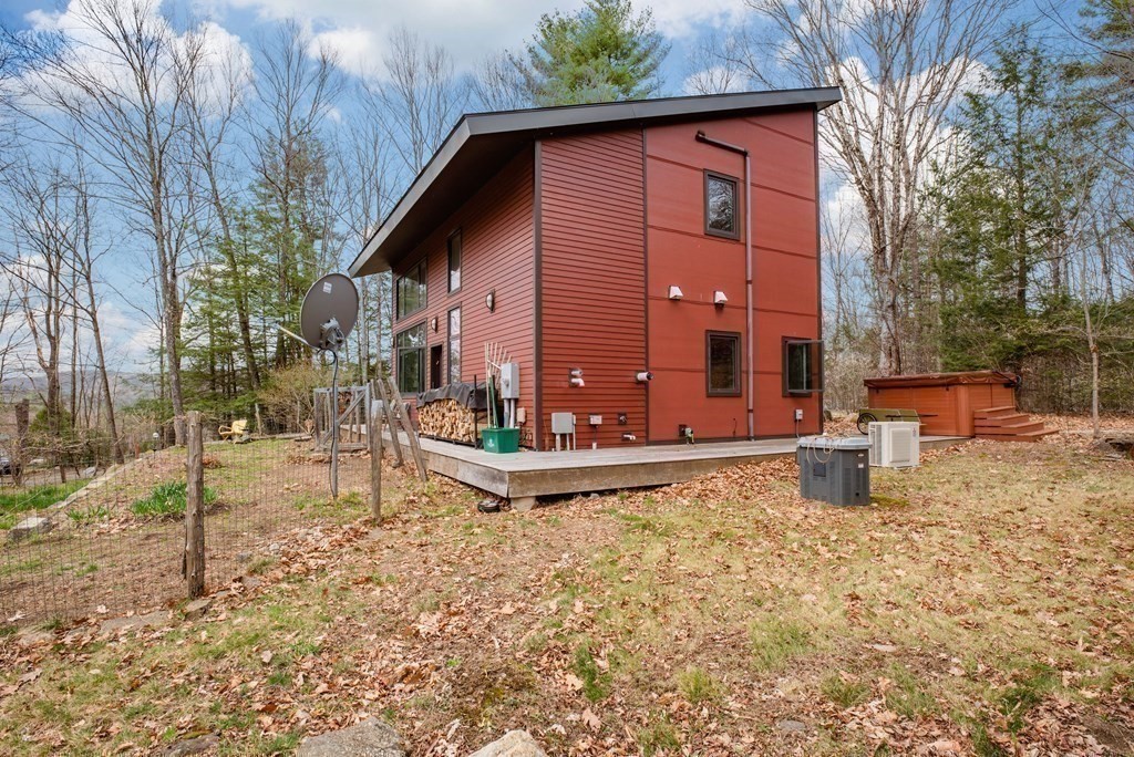 113 Indian Hollow Road Chesterfield, MA 01012 - Photo 31 of 42 a front view of a house with a yard