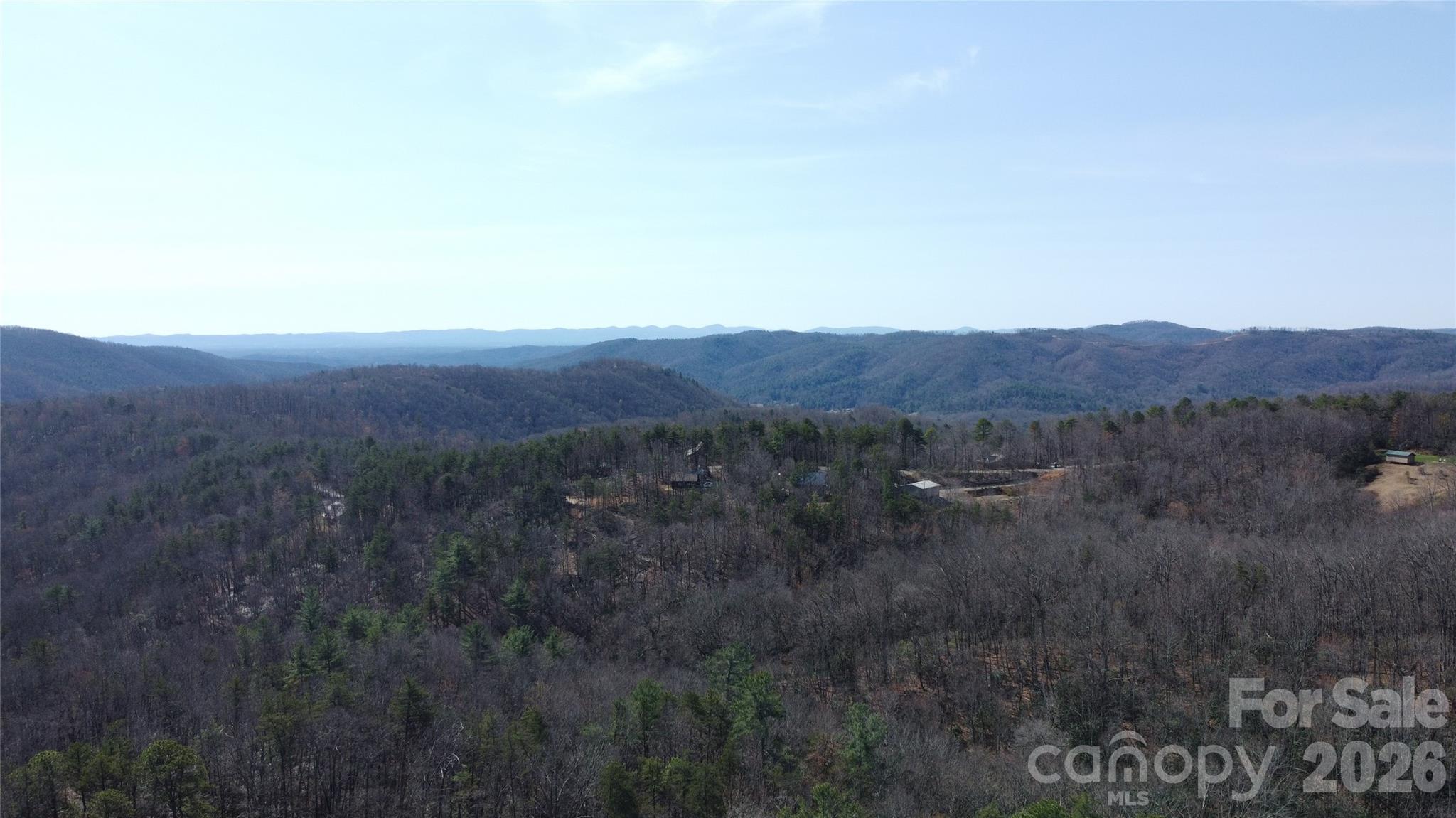 0 Wilderness Road Hays, NC 28635 - Photo 4 of 12 a view of a large mountain with a mountain in the background
