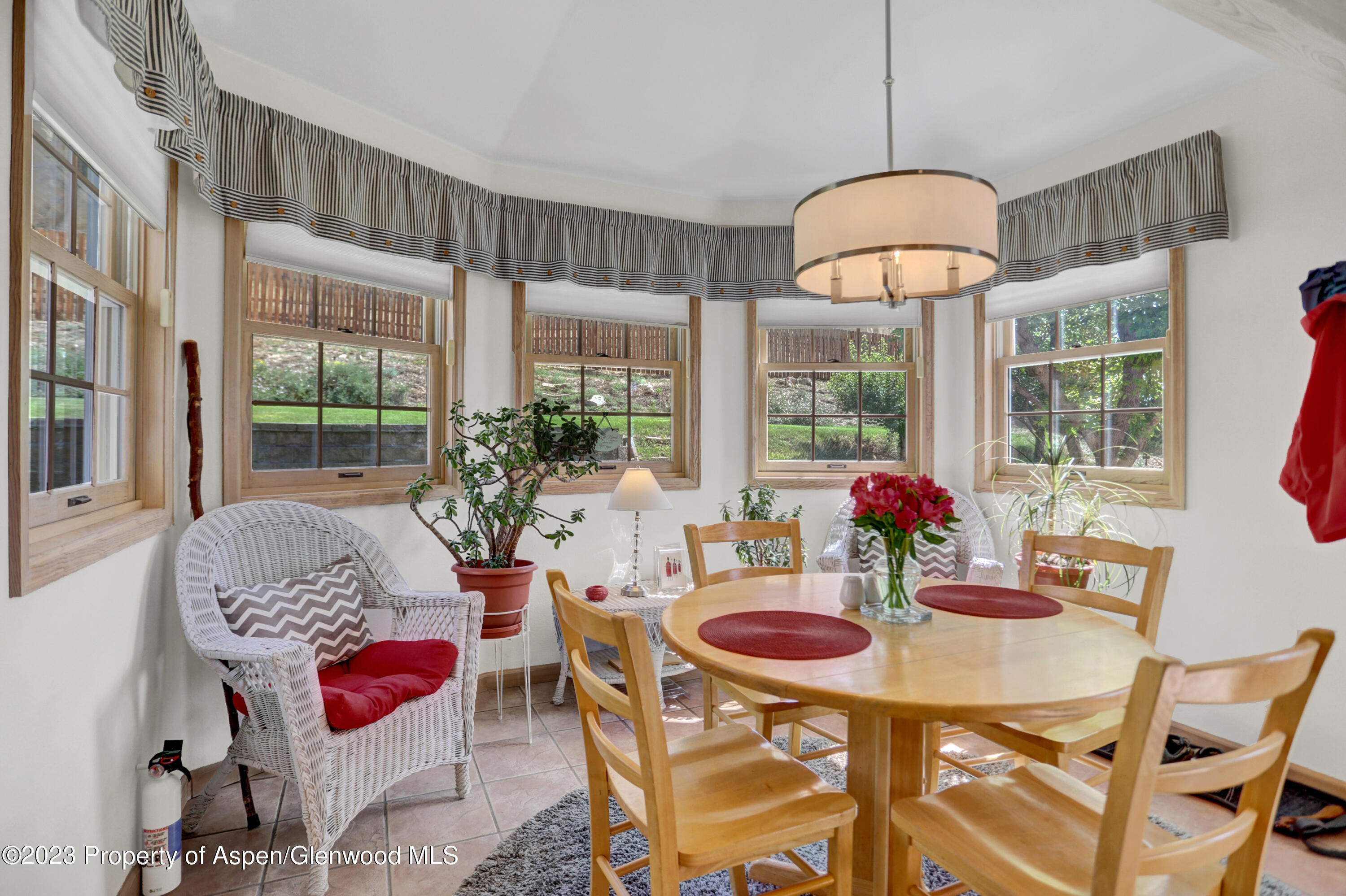 921 Alta Vista Drive Craig, CO 81625 - Photo 16 of 55 a view of a dining room with furniture window and outside view