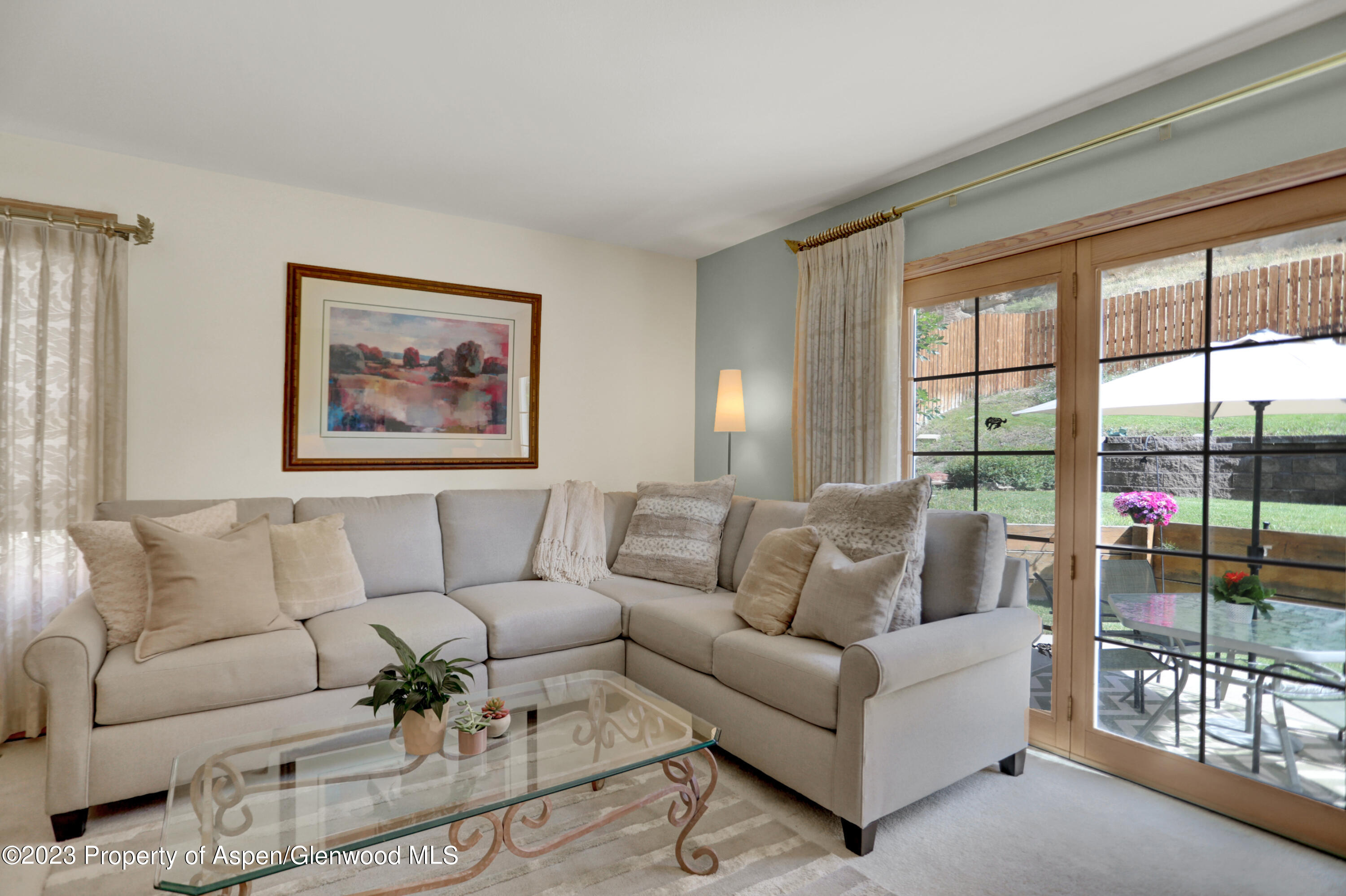921 Alta Vista Drive Craig, CO 81625 - Photo 18 of 55 a living room with furniture and a large window with outer view