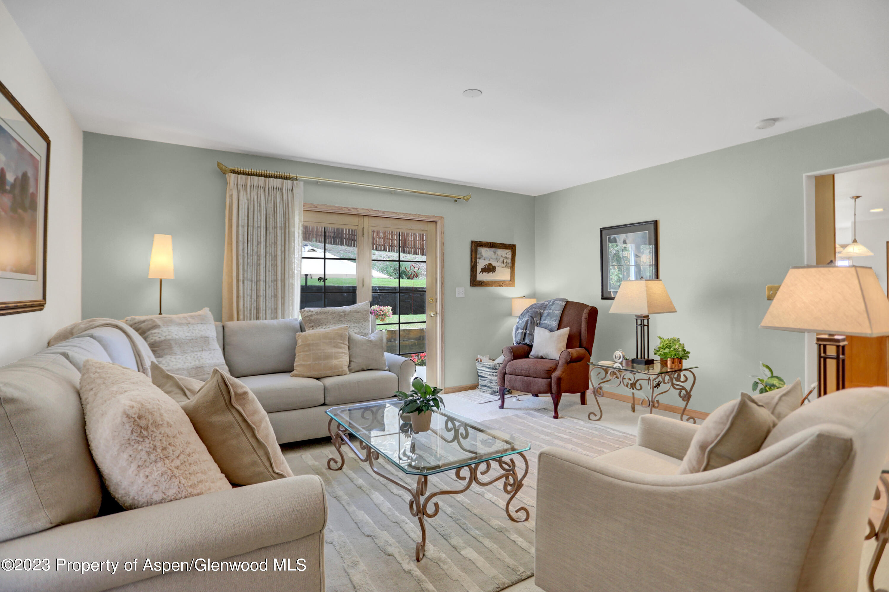 921 Alta Vista Drive Craig, CO 81625 - Photo 20 of 55 a living room with furniture and a large window