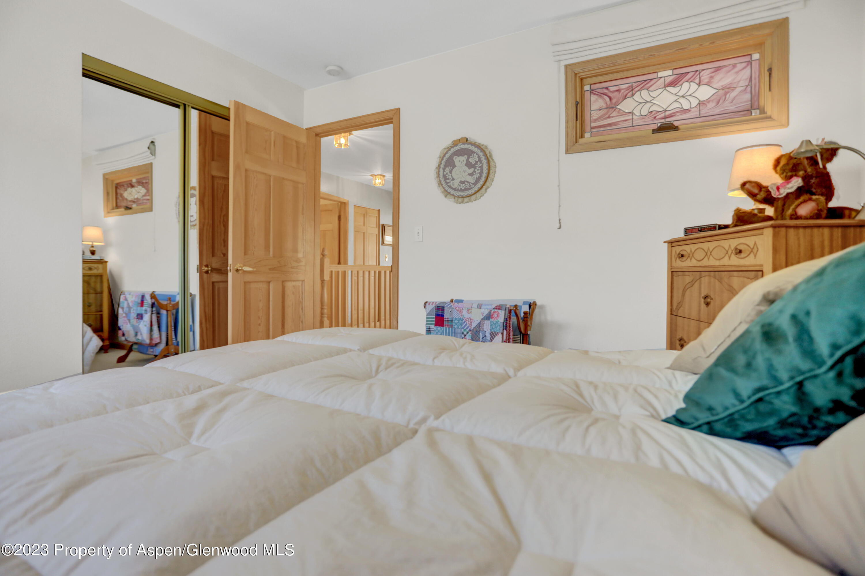 921 Alta Vista Drive Craig, CO 81625 - Photo 26 of 55 a bedroom with a bed and a couch