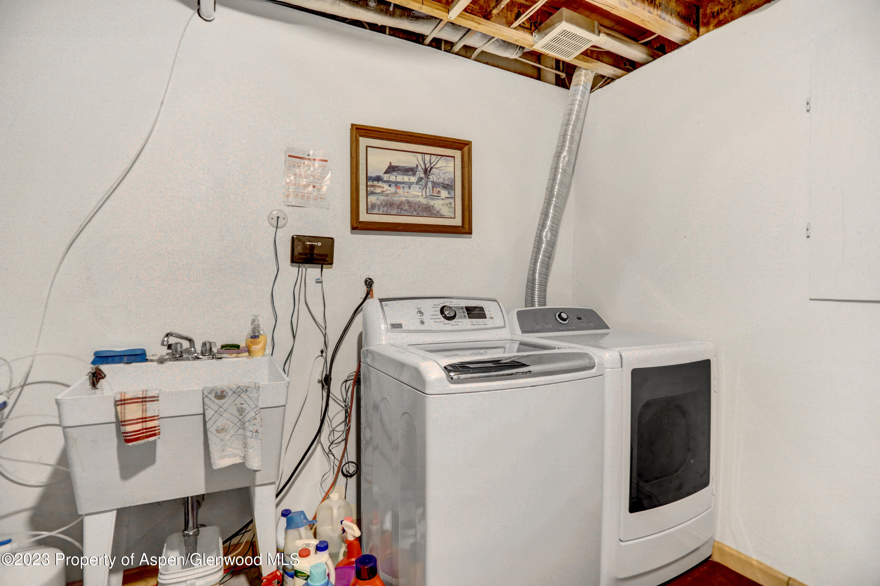 921 Alta Vista Drive Craig, CO 81625 - Photo 46 of 55 a utility room with dryer and washer