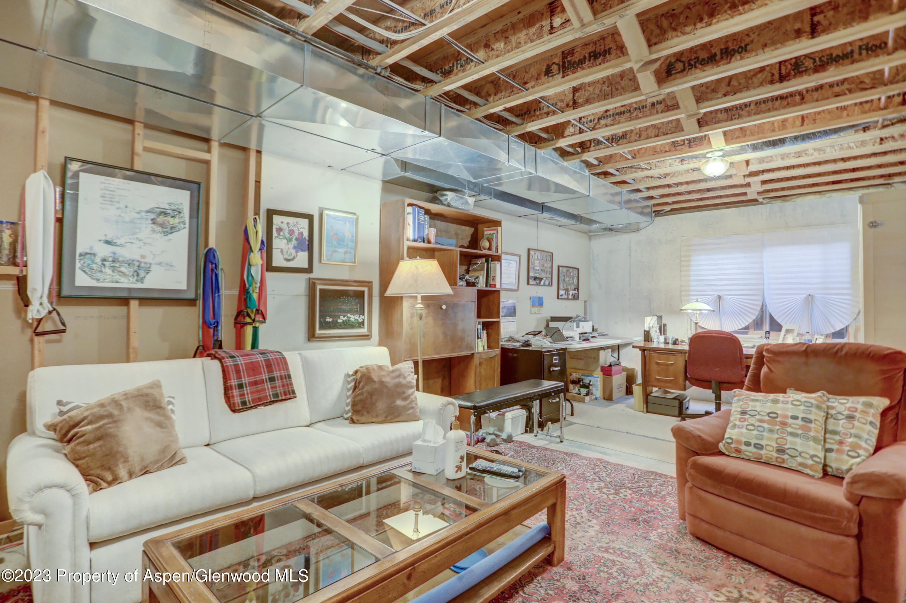 921 Alta Vista Drive Craig, CO 81625 - Photo 48 of 55 a living room with furniture and wooden floor