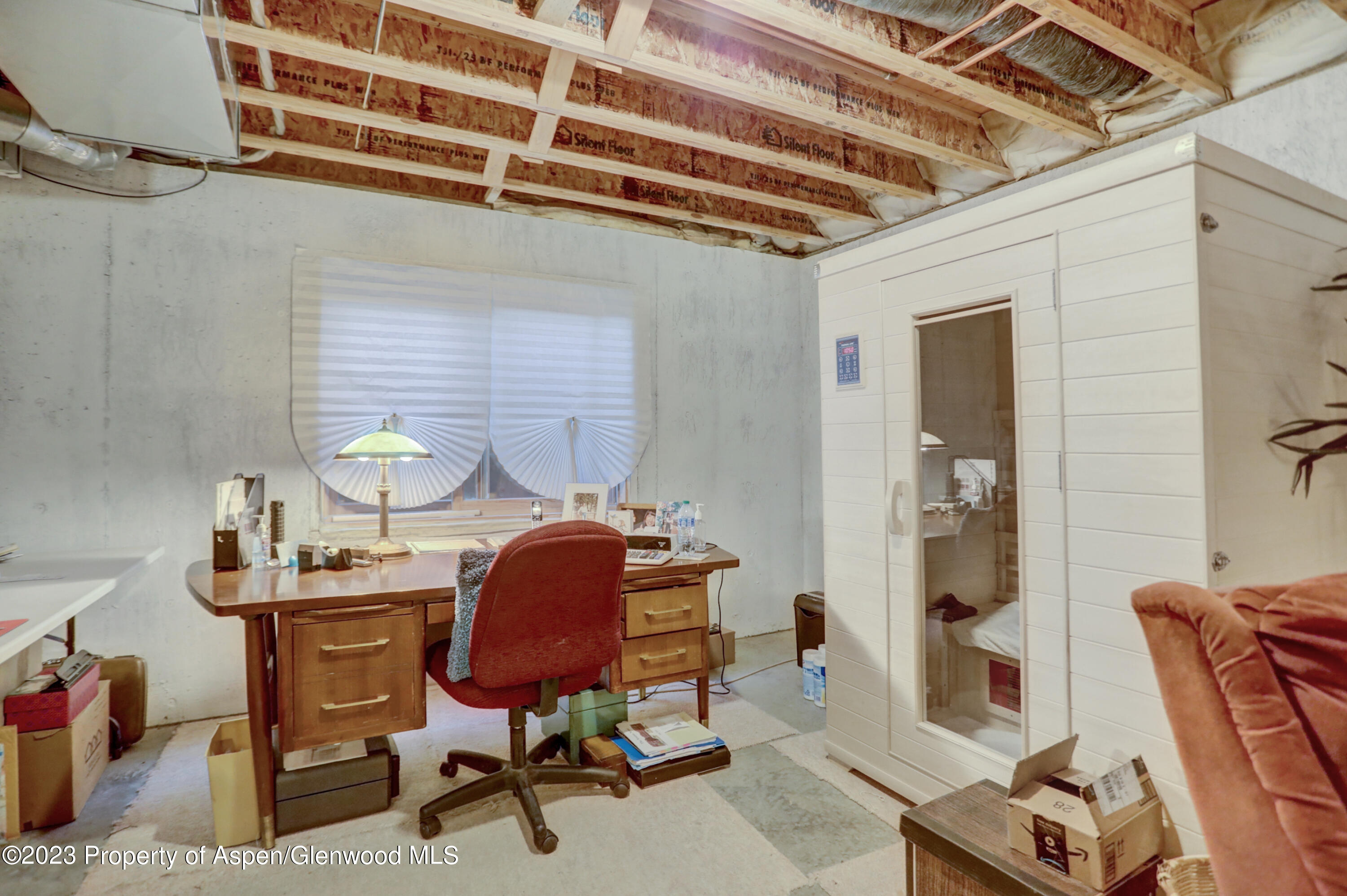 921 Alta Vista Drive Craig, CO 81625 - Photo 50 of 55 a workspace with furniture and a chandelier