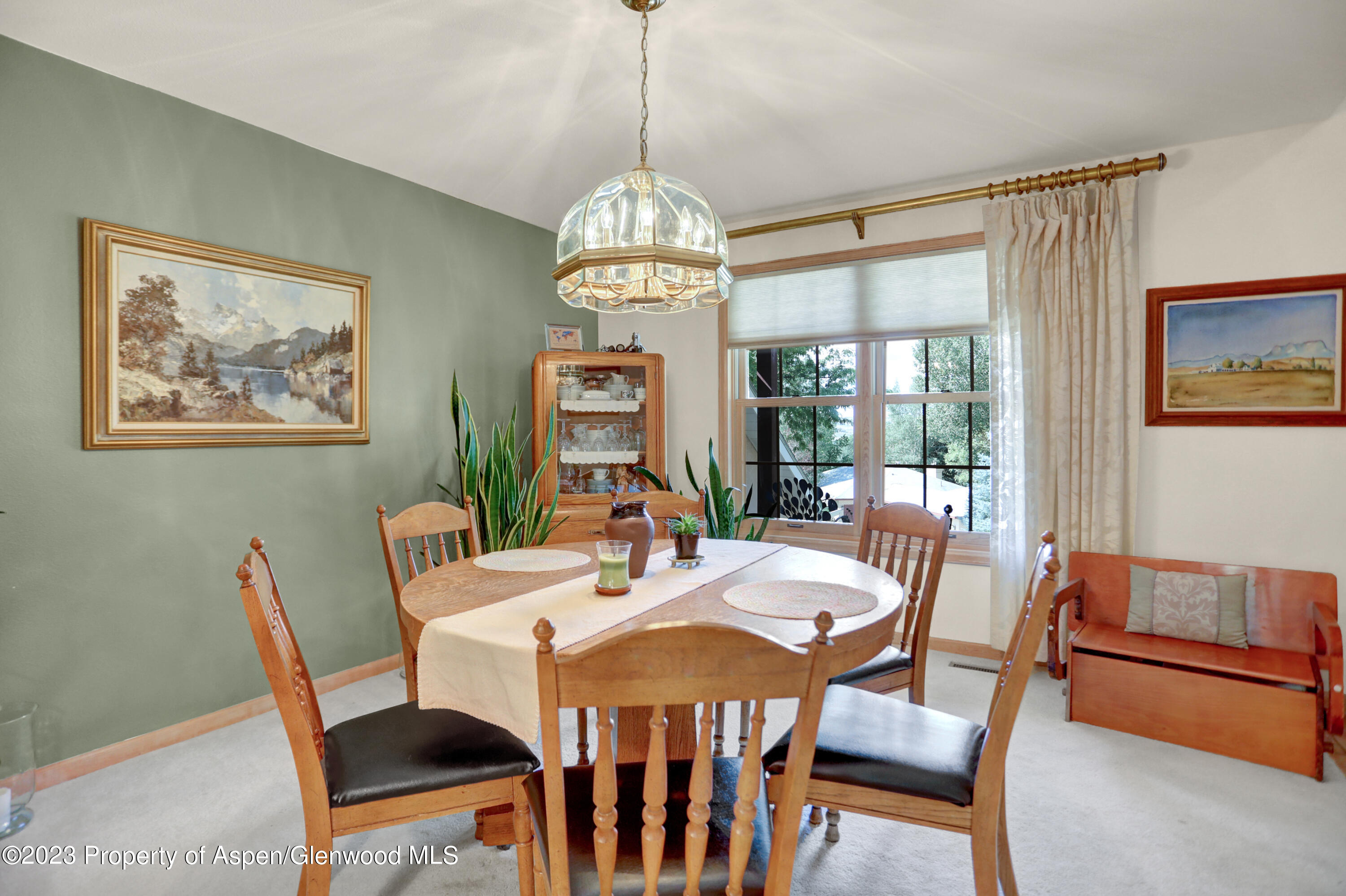 921 Alta Vista Drive Craig, CO 81625 - Photo 10 of 55 a view of a dining room with furniture window and outside view