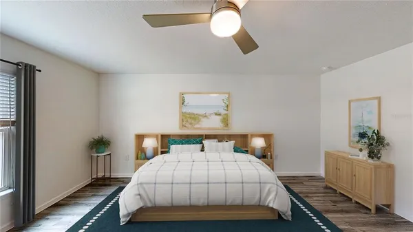 a bedroom with a bed and window