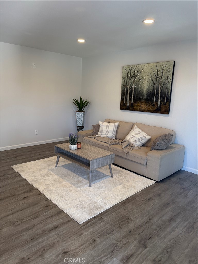 3458 Thunder Drive Oceanside, CA 92056 - Photo 2 of 13 a living room with furniture and wooden floor