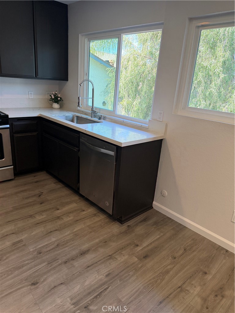 3458 Thunder Drive Oceanside, CA 92056 - Photo 6 of 13 a kitchen with a sink and a window