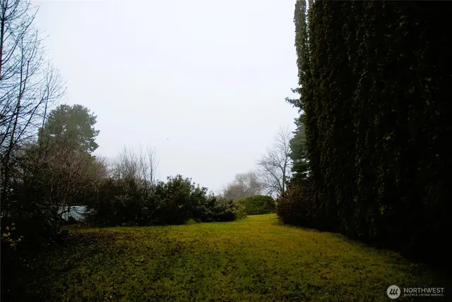 an aerial view of a town with couple of houses
