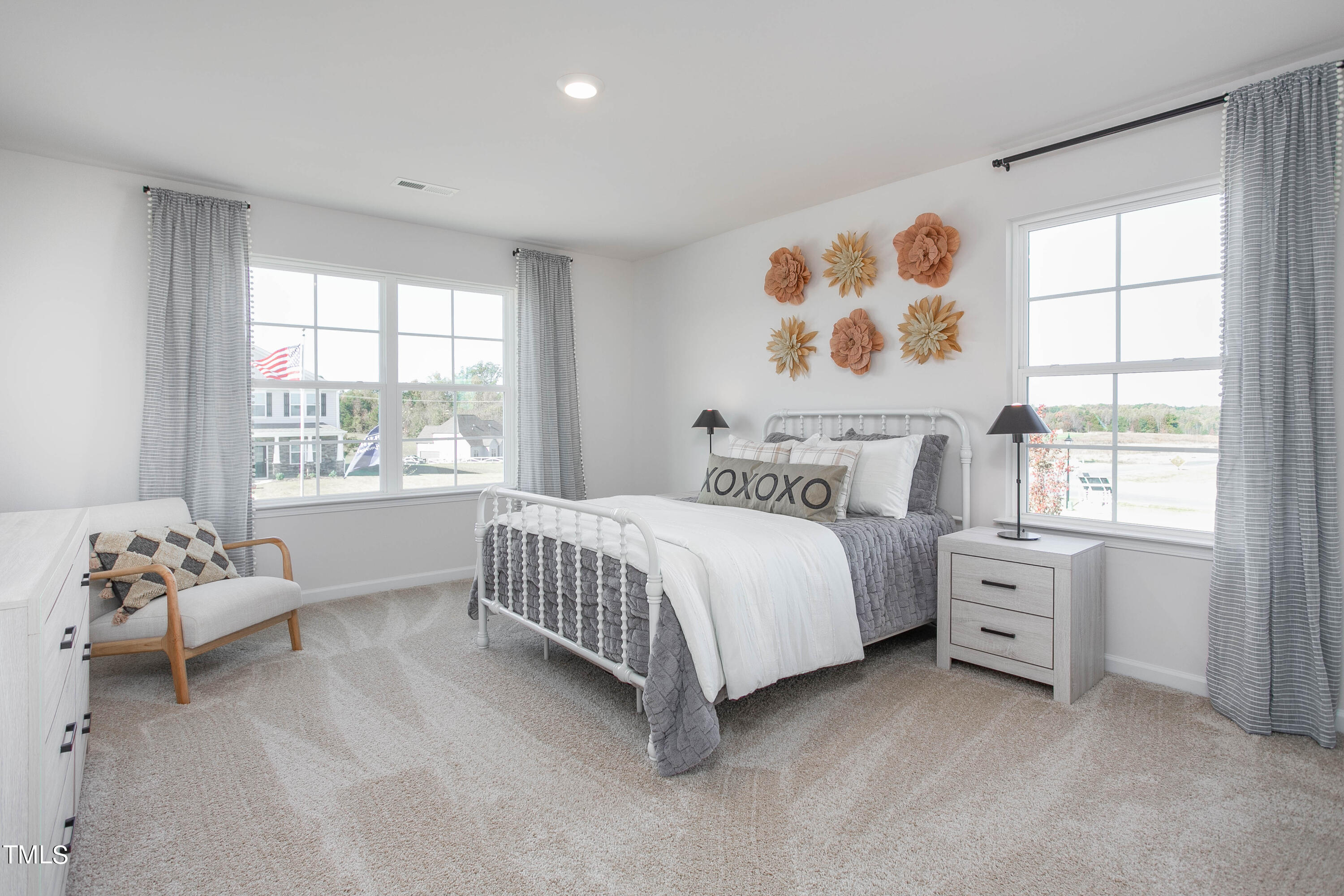 2017 Delta Road Vass, NC 28394 - Photo 28 of 38 a spacious bedroom with a bed and a window
