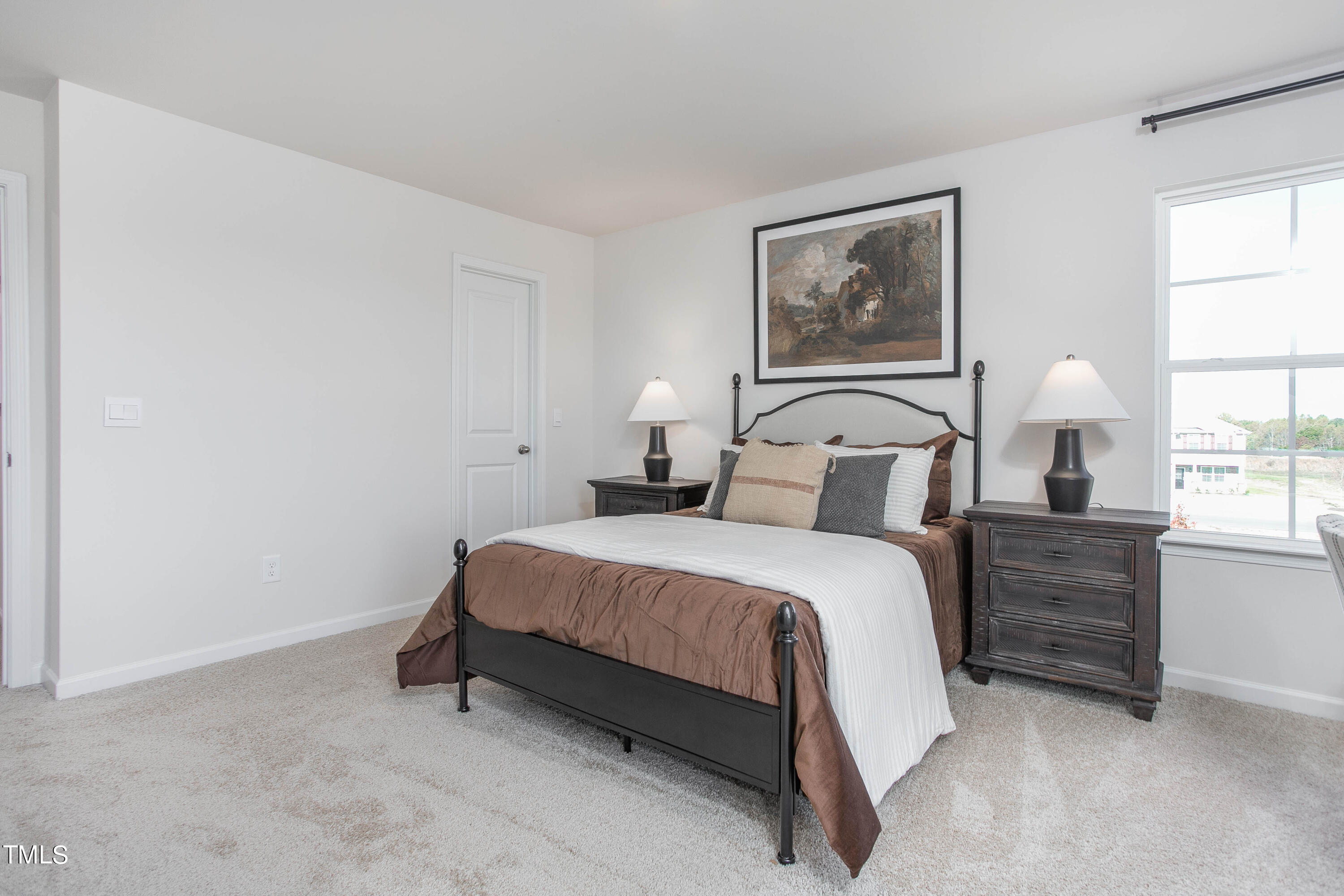 2017 Delta Road Vass, NC 28394 - Photo 32 of 38 a bedroom with a bed and a window