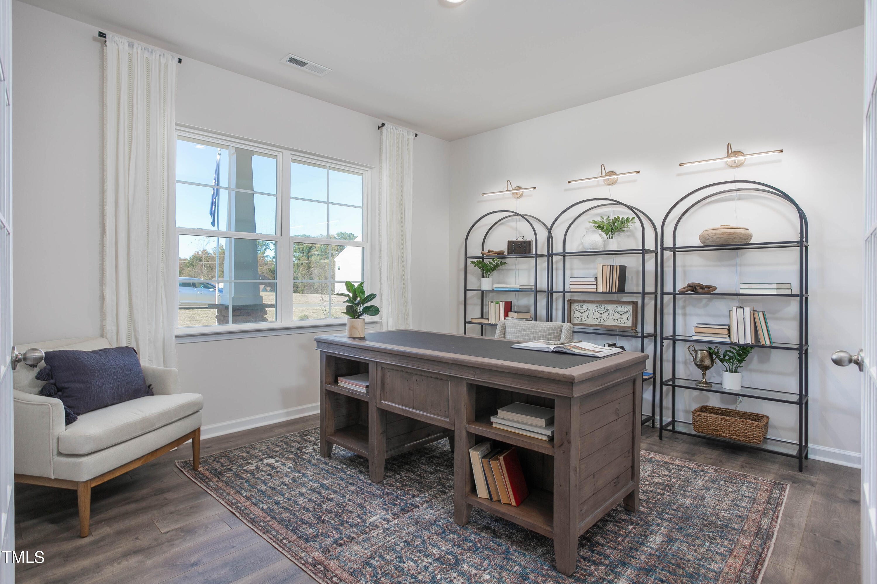 2017 Delta Road Vass, NC 28394 - Photo 4 of 38 a view of a livingroom with furniture and window