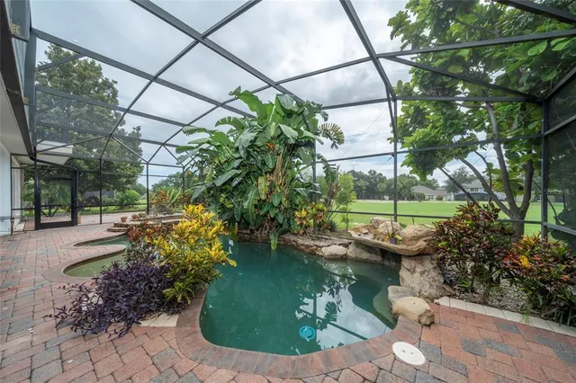 a view of a garden with a fountain