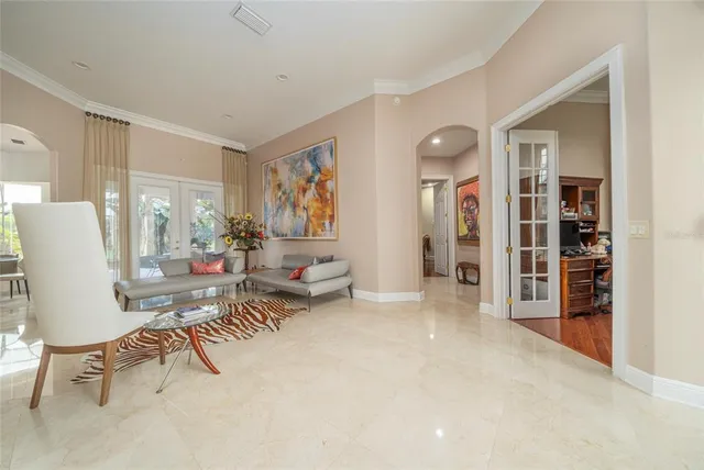 a living room with furniture and a area