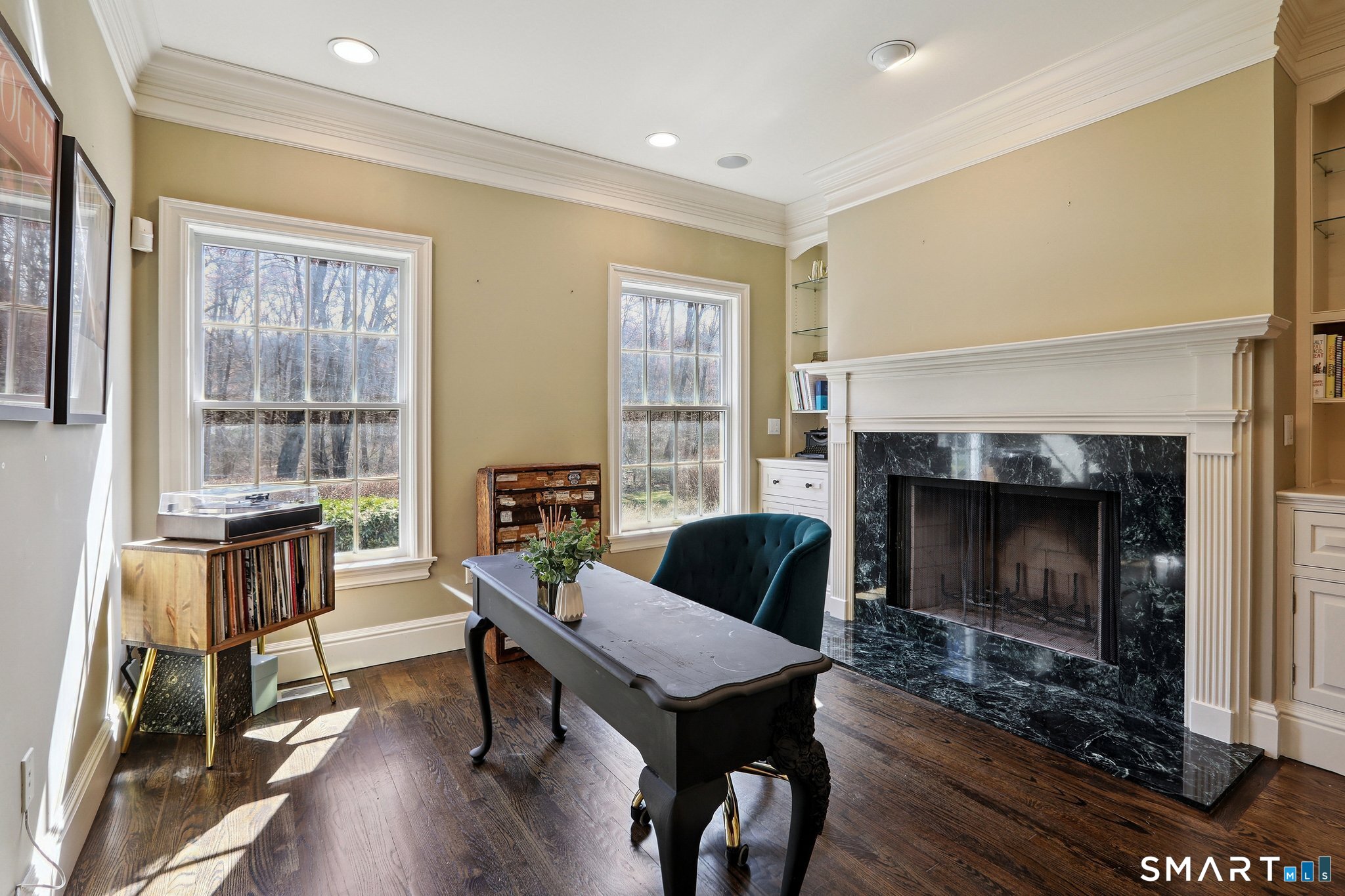 100 Chestnut Hill Road Ridgefield, CT 06877 - Photo 13 of 40 a living room with furniture and a fireplace