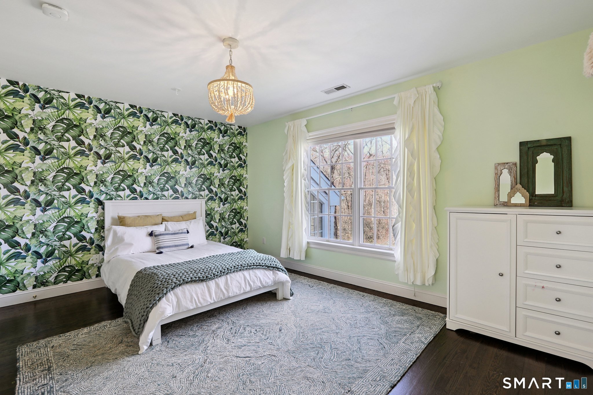 100 Chestnut Hill Road Ridgefield, CT 06877 - Photo 20 of 40 a bedroom with a bed window and dresser