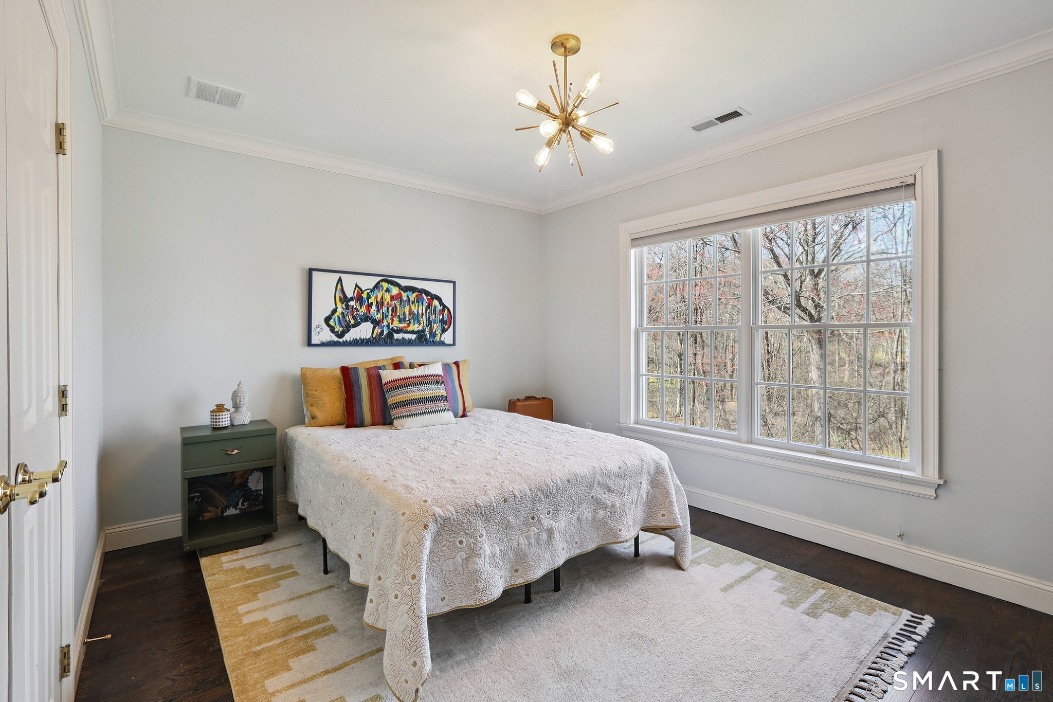 100 Chestnut Hill Road Ridgefield, CT 06877 - Photo 22 of 40 a bedroom with a bed and a window
