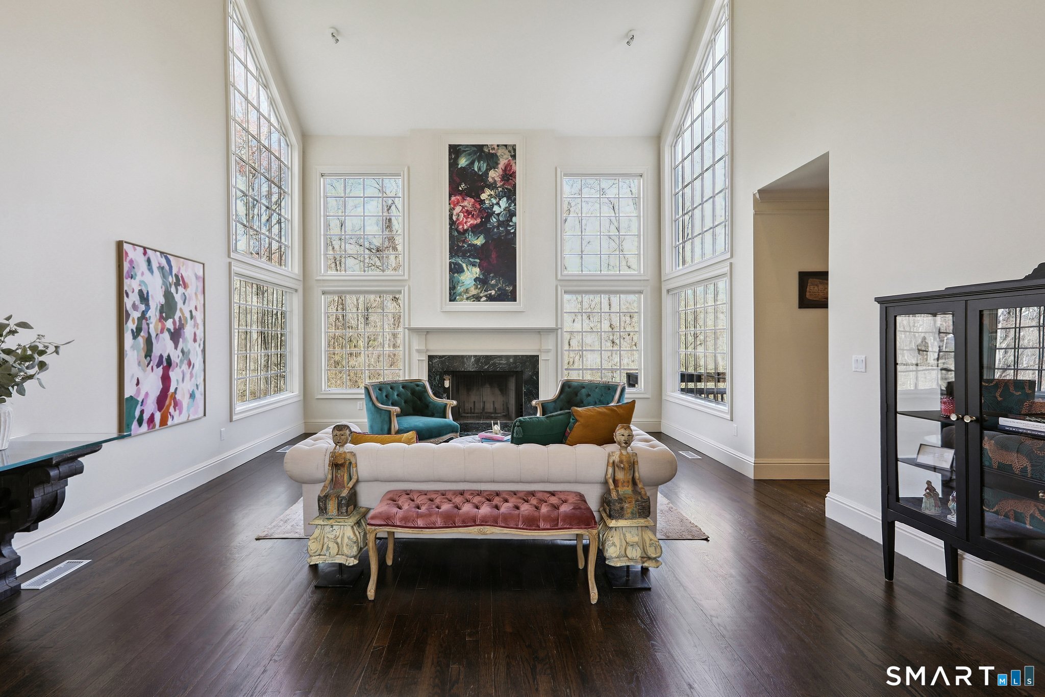 100 Chestnut Hill Road Ridgefield, CT 06877 - Photo 3 of 40 a living room with furniture wooden floor and a fireplace
