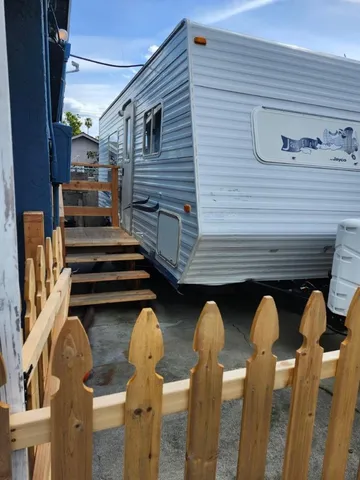 a kitchen with a stove and a microwave
