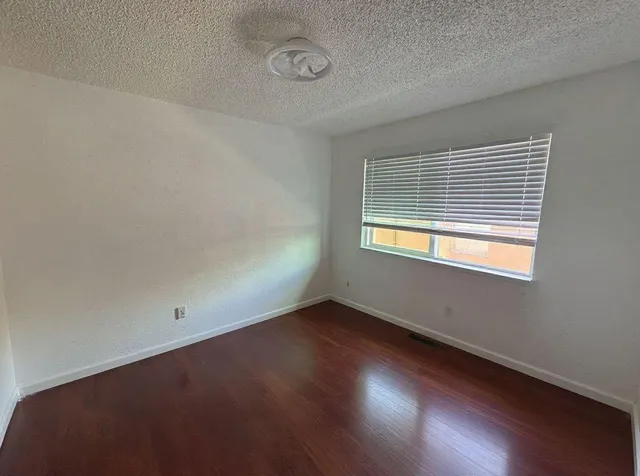 a bathroom with a sink and a mirror with toilet