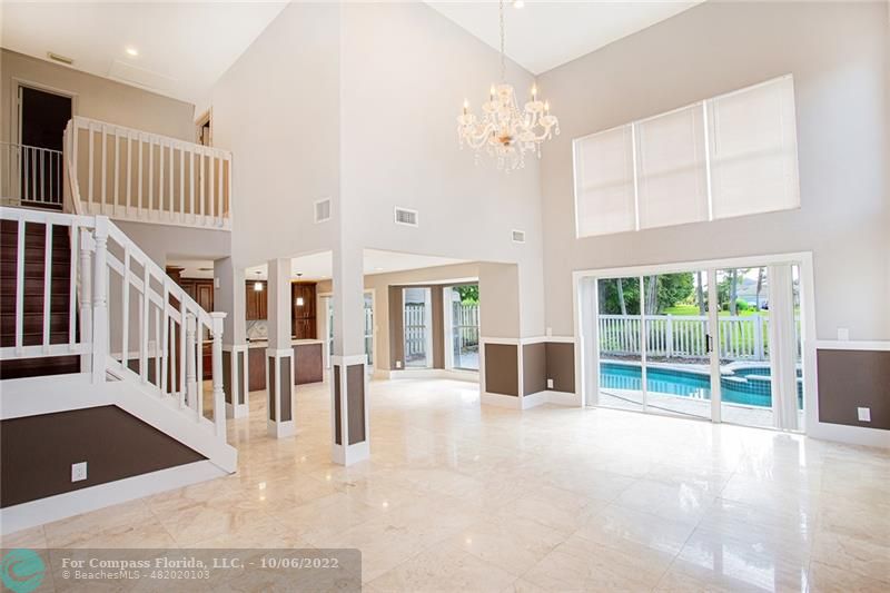 a view of a hall with windows